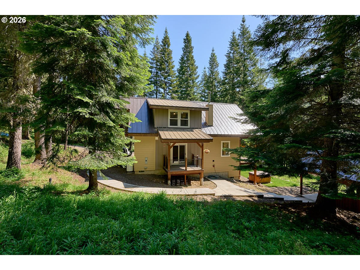 64368 Tamarack Road Lostine, OR 97857 - Photo 35 of 39 a view of a house with a backyard