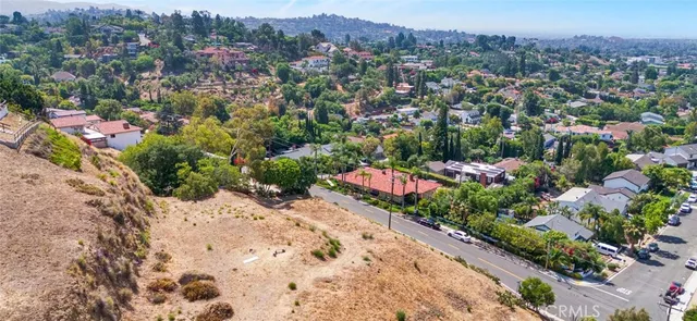 a view of swimming pool with a yard