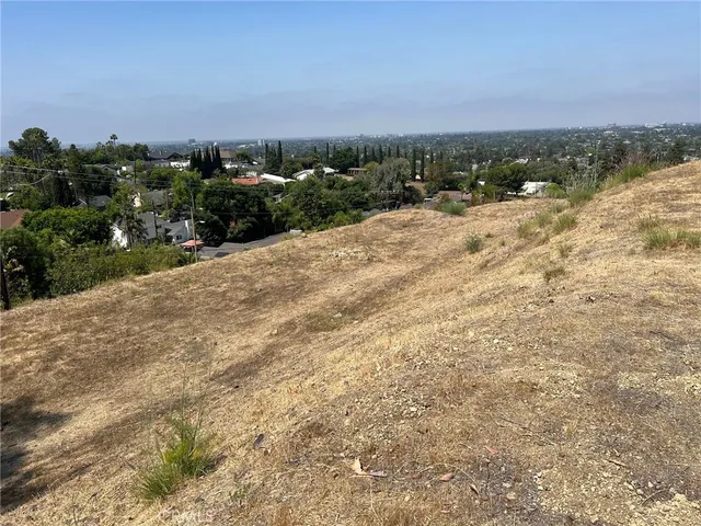 a view of a lake with beach