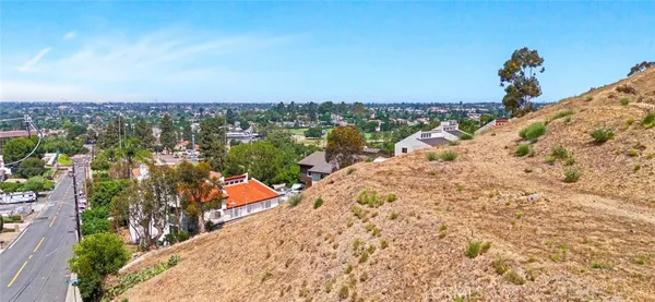 a view of a backyard of a house