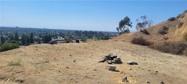 a kitchen filled with appliances a sink a counter top space and cabinets