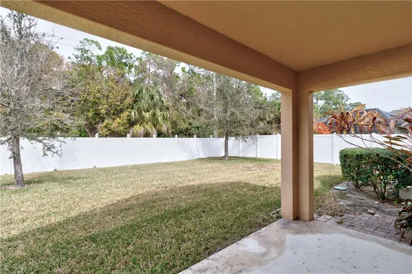 a view of a yard with an outdoor space