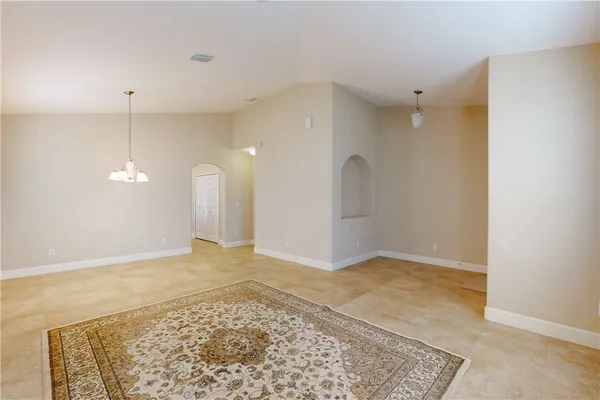a view of a big room with a fireplace