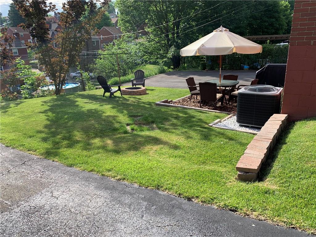 4305 Highgrove Road Pittsburgh, PA 15236 - Photo 3 of 24 Backyard with just enough space to enjoy many hours of entertaining guests!
