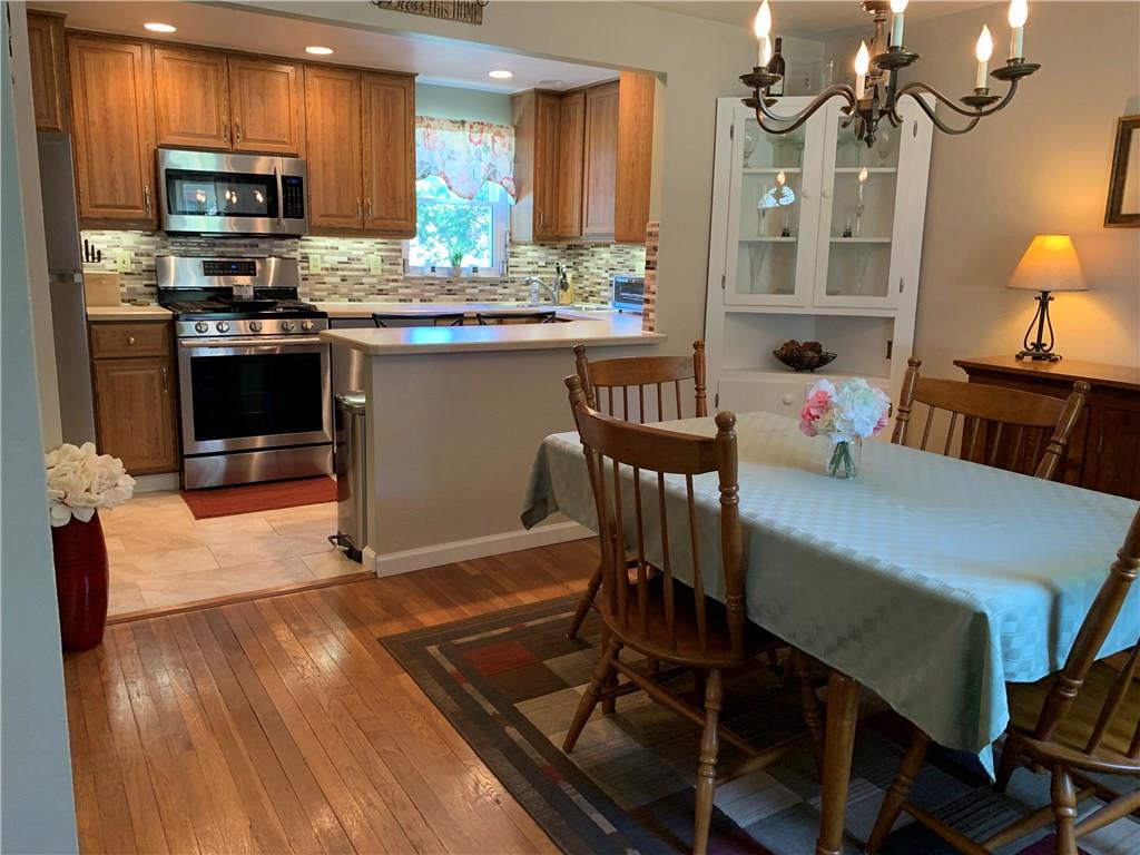 4305 Highgrove Road Pittsburgh, PA 15236 - Photo 9 of 24 Nice size dining room with hard wood floors!
