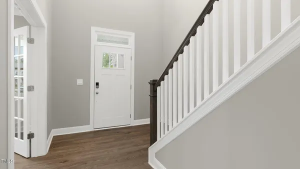 a view of staircase with wooden floor and staircase