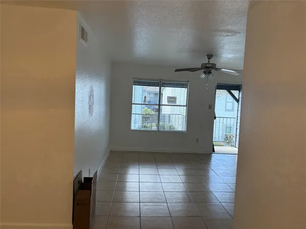 a view of empty room with windows