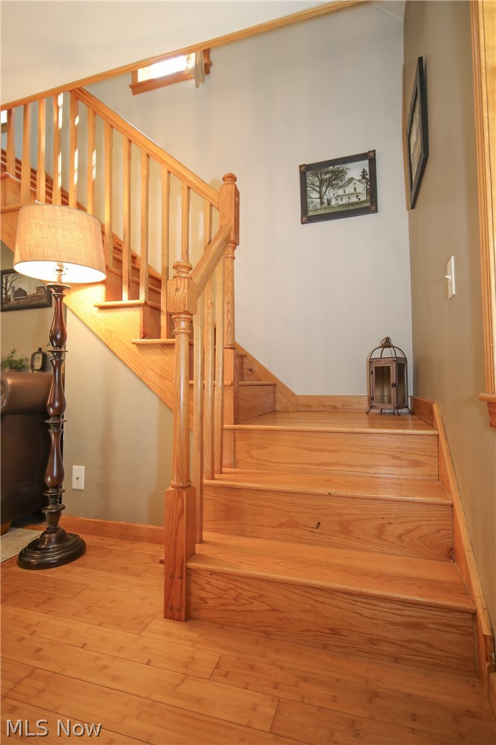 38610 Spiedel Town Road Bethesda, OH 43719 - Photo 29 of 33 Stairway with wood-type flooring