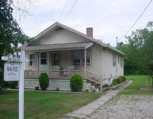 Marne Park Road Bantam, CT 06750 - Photo 1 of 1 a front view of a house with garden