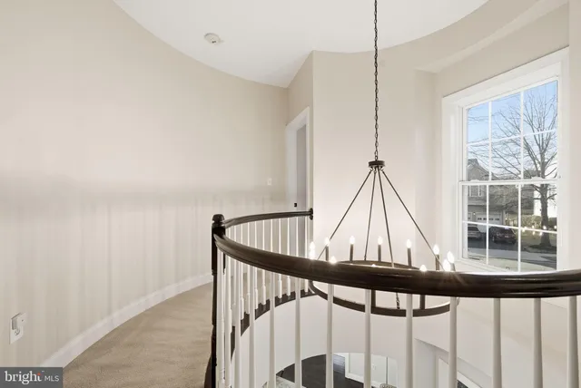 a view of staircase with a large window