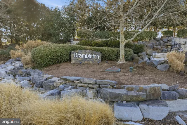 a view of swimming pool with a yard
