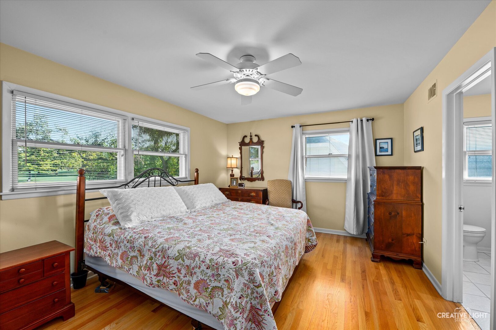 713 Burning Tree Lane Naperville, IL 60563 - Photo 21 of 35 a bed sitting in a spacious bedroom next to a window