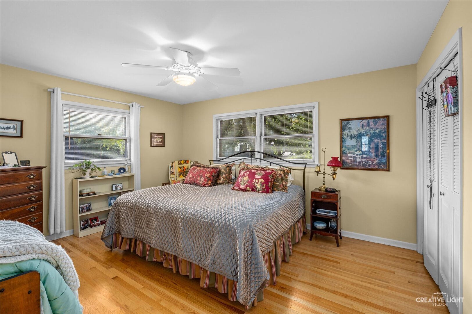 713 Burning Tree Lane Naperville, IL 60563 - Photo 26 of 35 a bedroom with a bed and a dresser