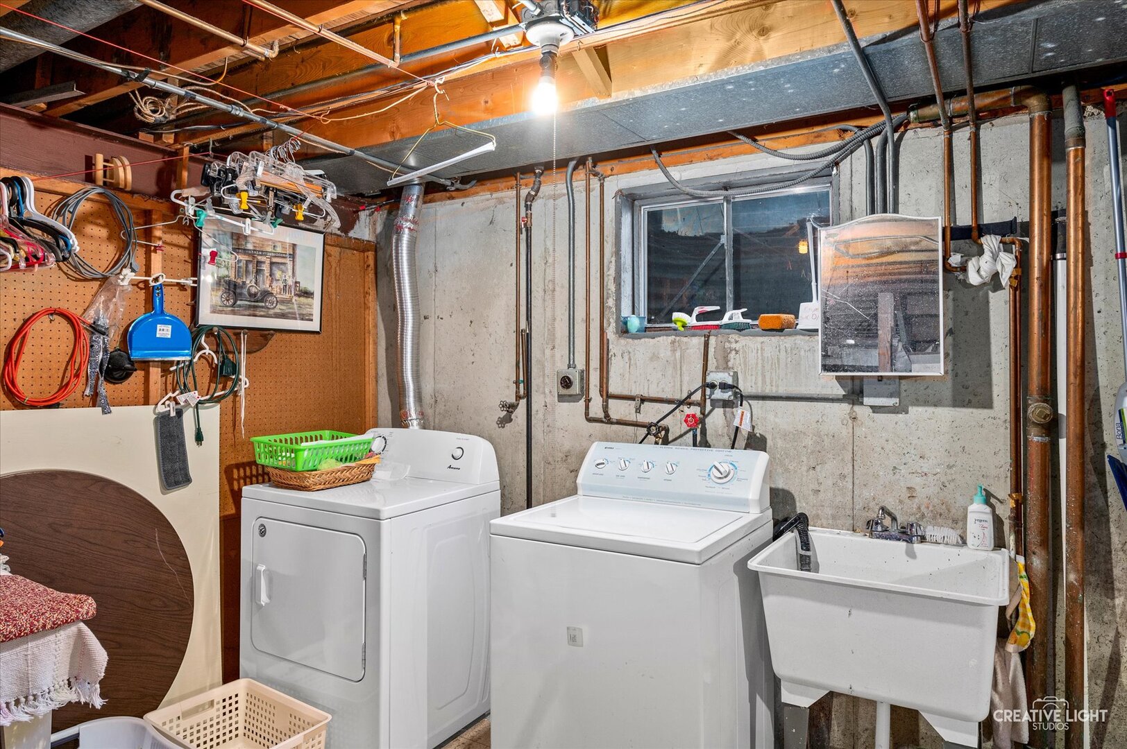 713 Burning Tree Lane Naperville, IL 60563 - Photo 30 of 35 a utility room with dryer and washer