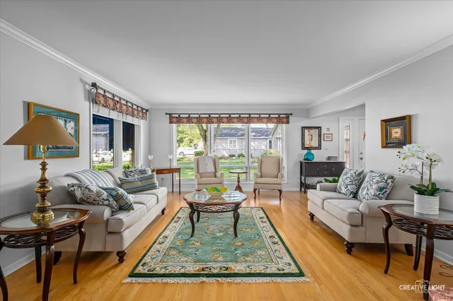 a living room with furniture and a rug