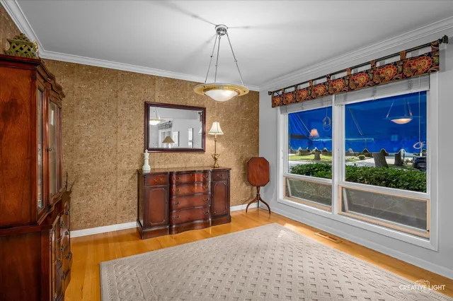 a bedroom with furniture and window