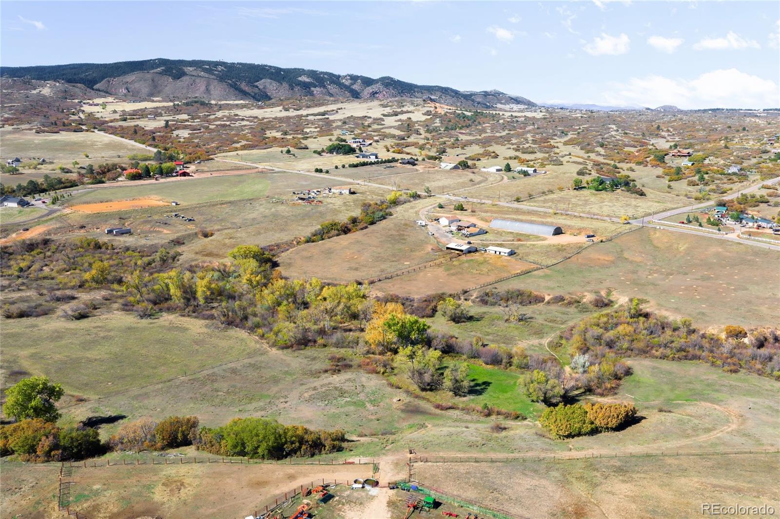 5354 Jackson Creek Road Sedalia, CO 80135 - Photo 1 of 47 a view of city and ocean