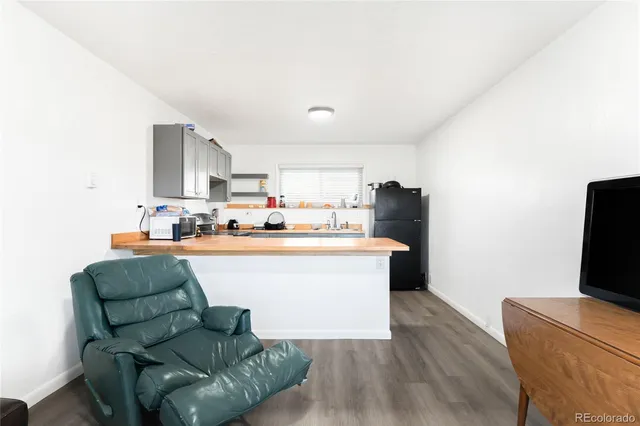 a living room with a couch and a flat screen tv