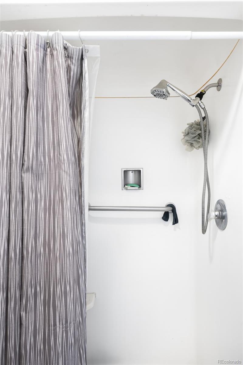 5354 Jackson Creek Road Sedalia, CO 80135 - Photo 38 of 47 a close view of a shower curtain