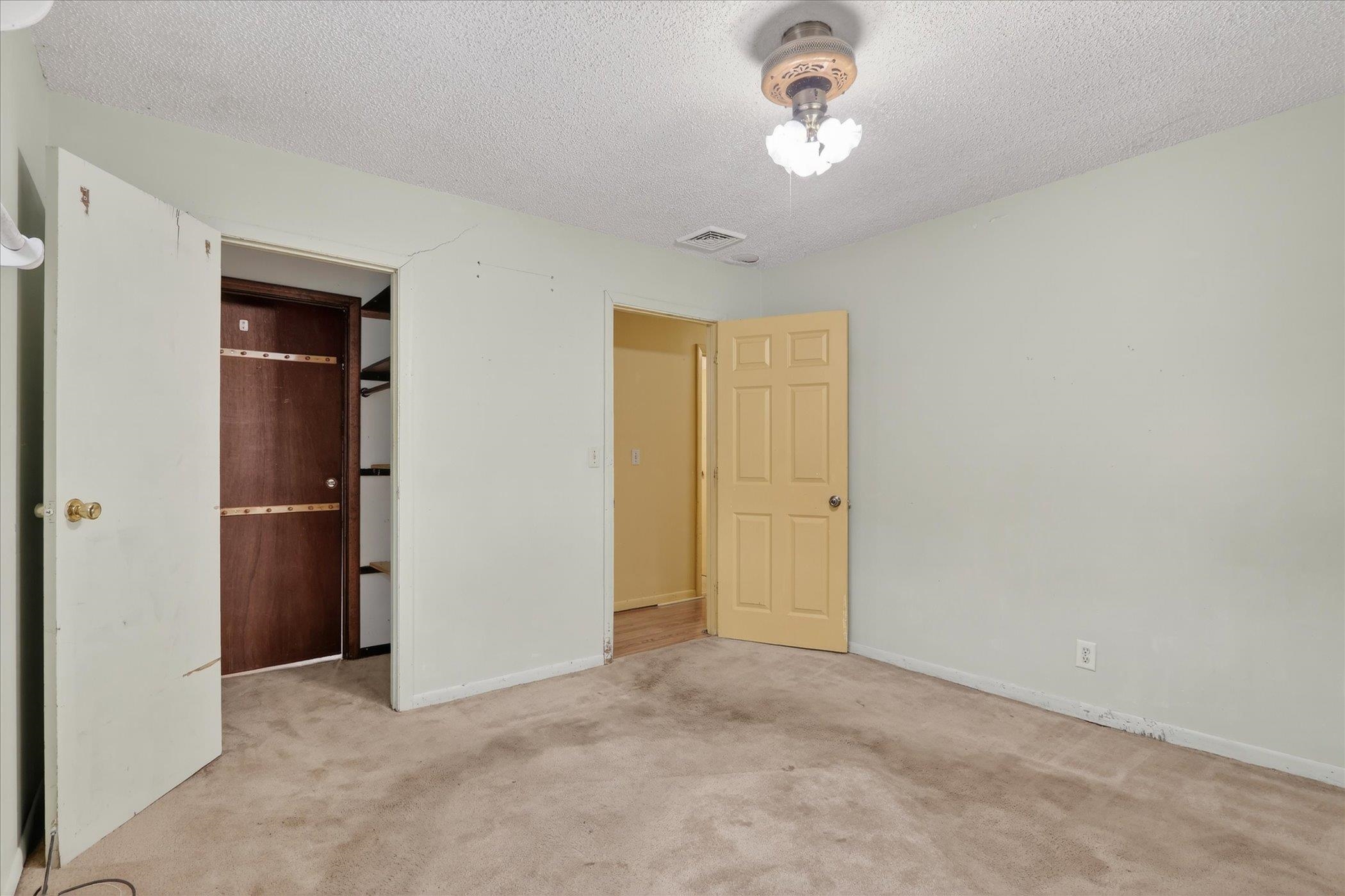 219 River Road Rochelle, IL 61068 - Photo 22 of 40 an empty room with chandelier fan