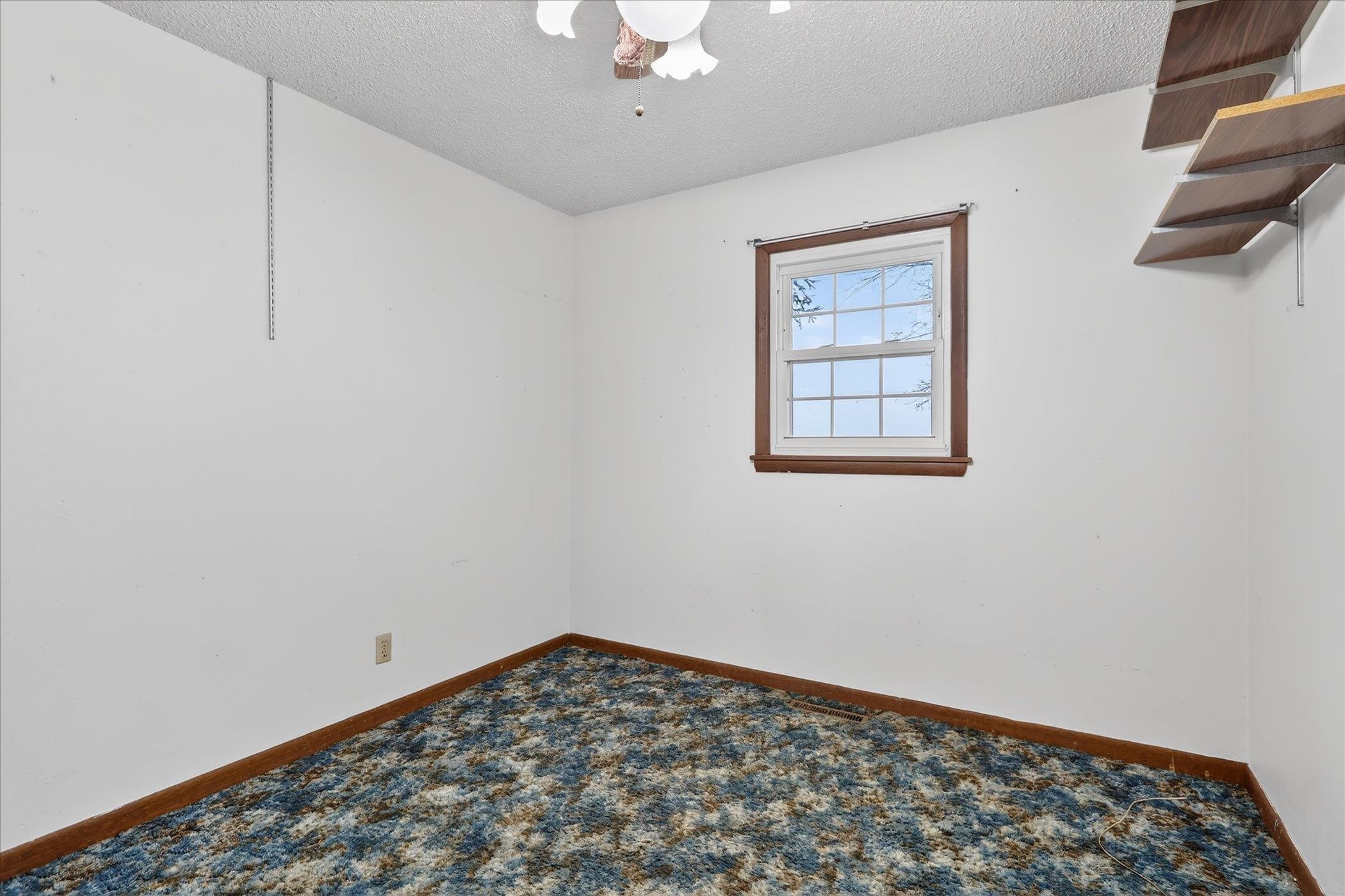 219 River Road Rochelle, IL 61068 - Photo 27 of 40 a view of an empty room with a window