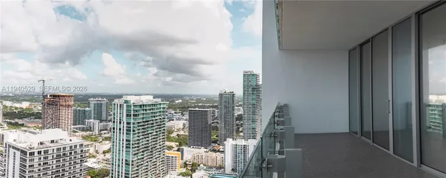 a view of a living room with a rug
