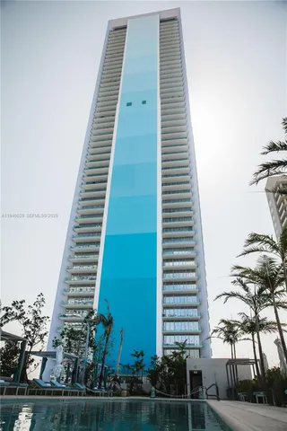 a room with gym equipment and a large window