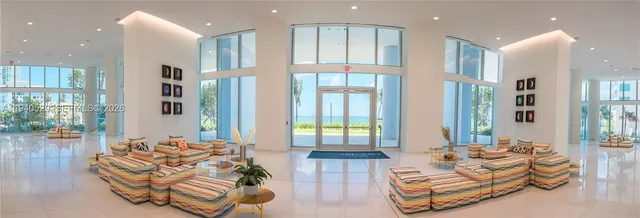 a view of a hallway with washer and dryer