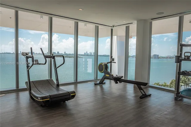 a view of street along with house and trees