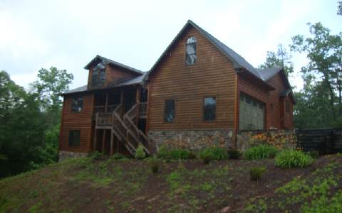 159 Lakota Trail Blue Ridge, GA 30513 - Photo 1 of 1 a view of a house with a yard