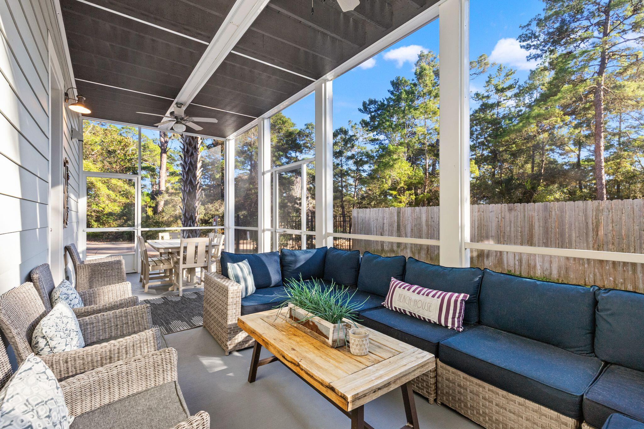 72 Magical Place Santa Rosa Beach, FL 32459 - Photo 12 of 44 a outdoor living space with furniture and garden view