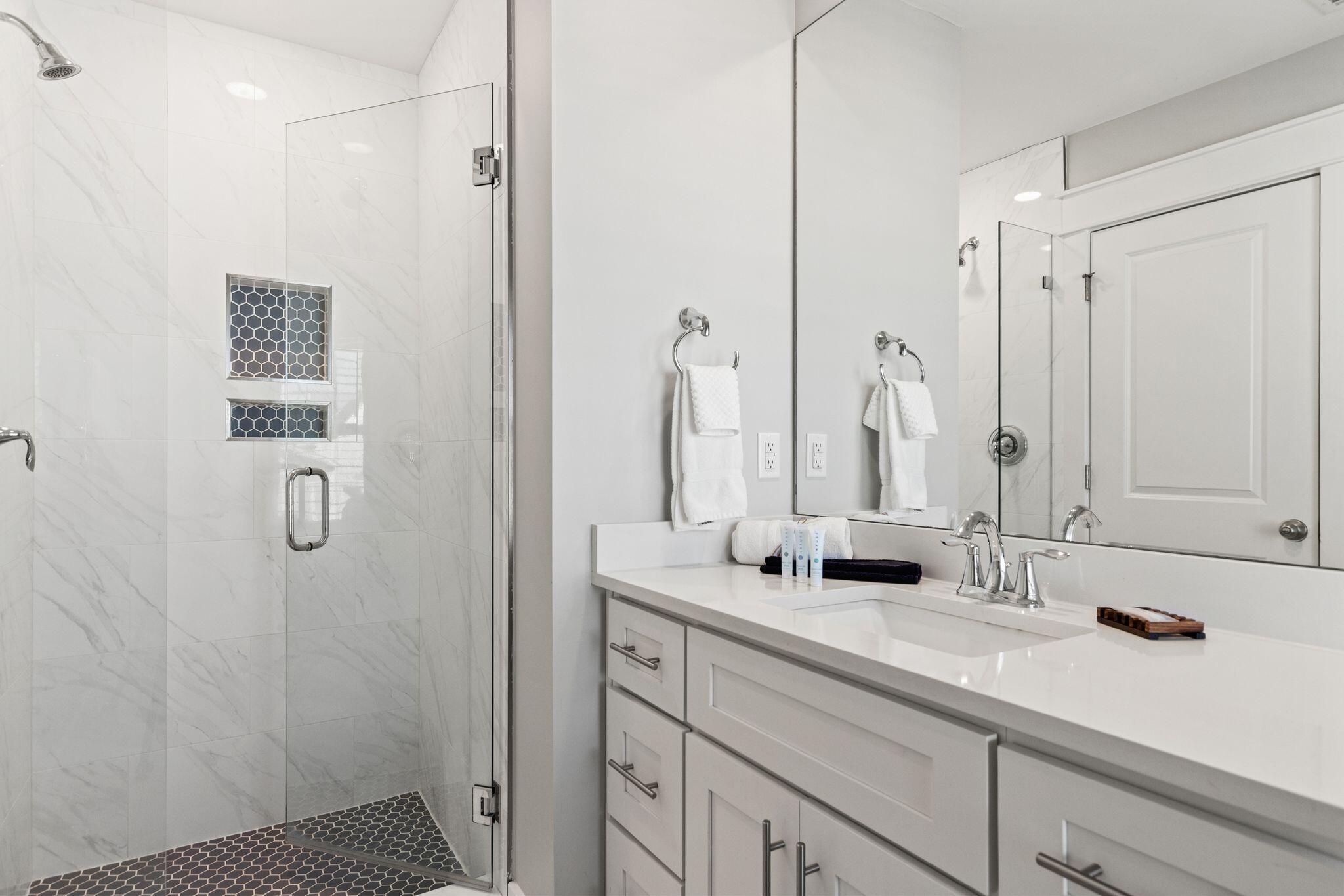 72 Magical Place Santa Rosa Beach, FL 32459 - Photo 30 of 44 a bathroom with double vanity sink and a mirror