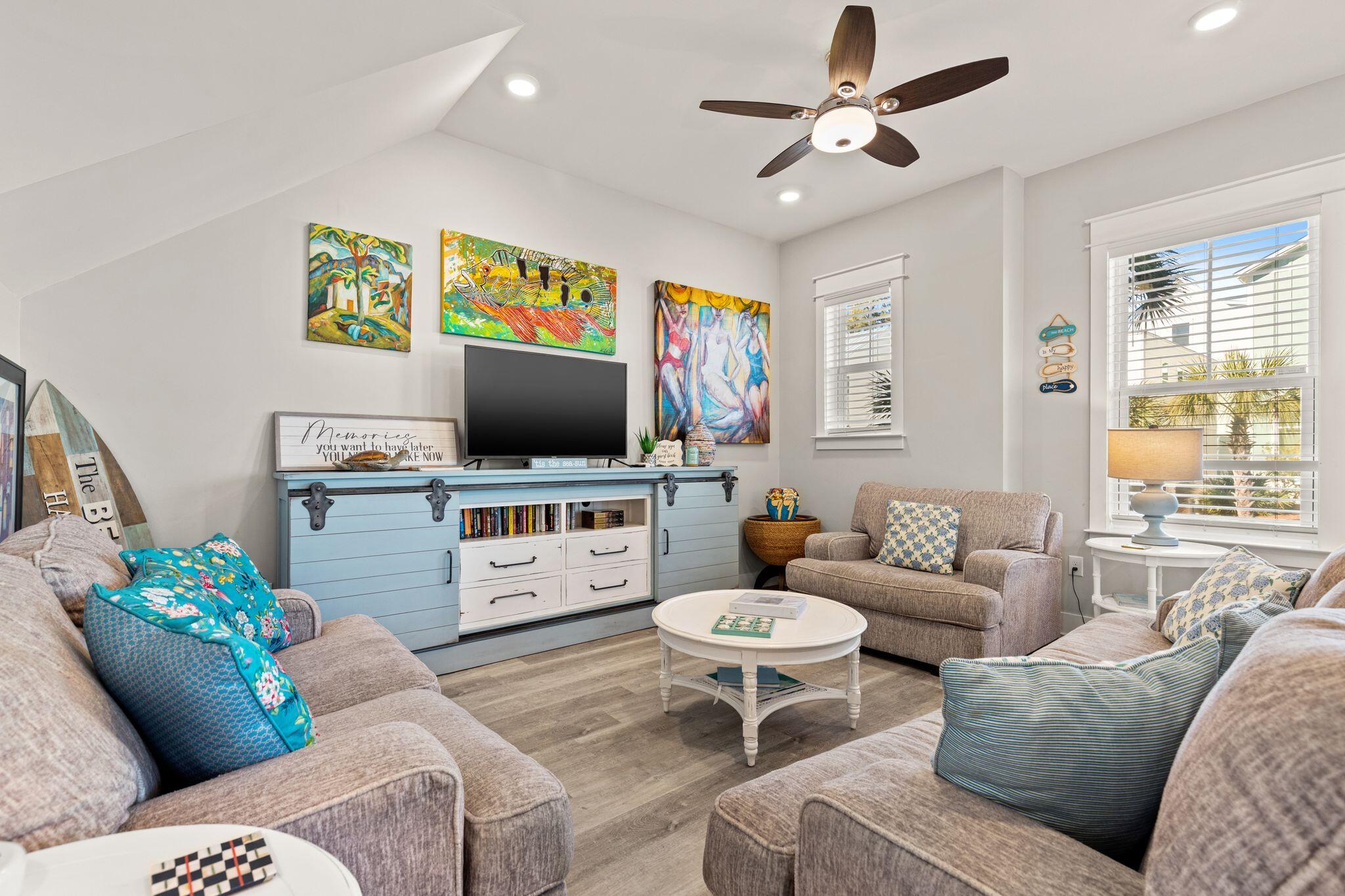 72 Magical Place Santa Rosa Beach, FL 32459 - Photo 5 of 44 a living room with furniture and a flat screen tv