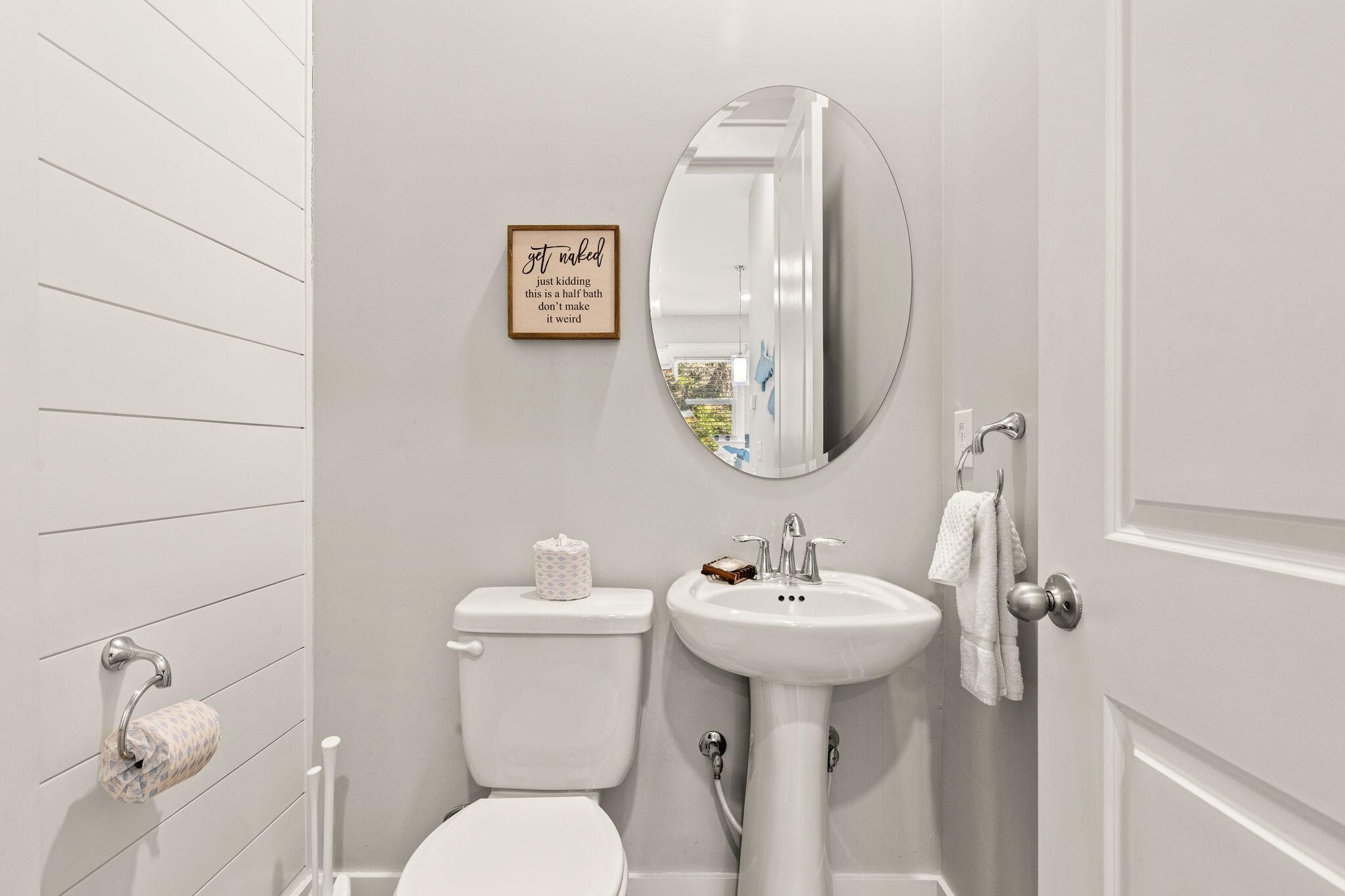 72 Magical Place Santa Rosa Beach, FL 32459 - Photo 10 of 44 a bathroom with a toilet sink and mirror