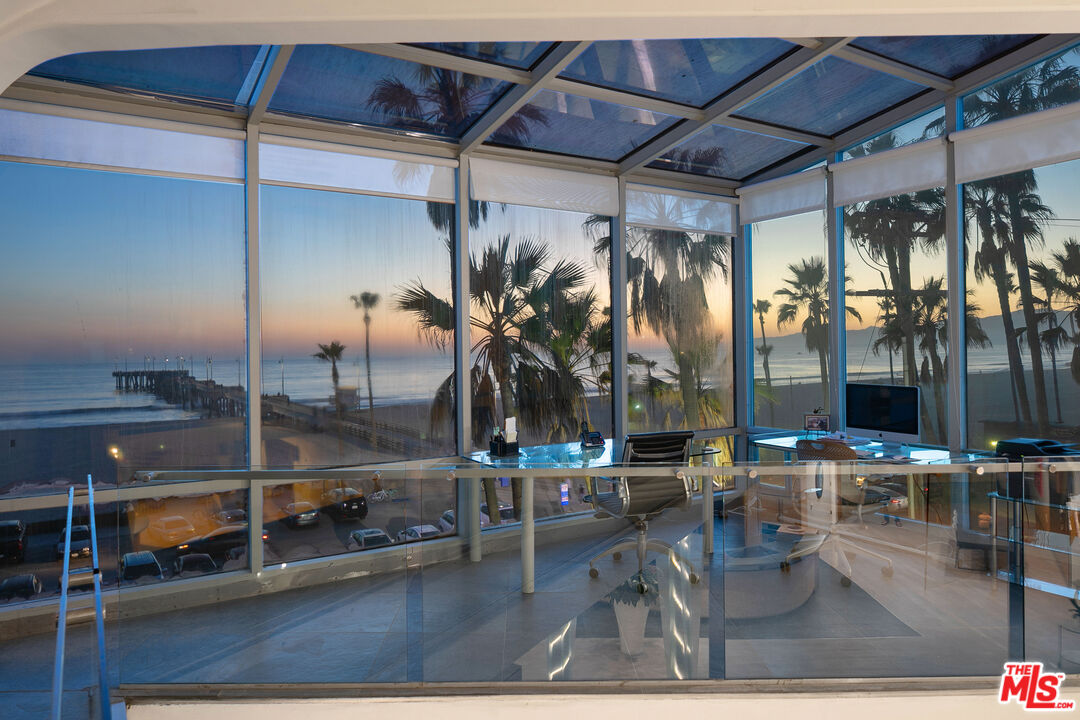 3111 Ocean Front Walk Marina del Rey, CA 90292 - Photo 9 of 17 a dining room with glass top table and chairs
