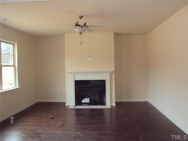 2333 Everstone Road Wake Forest, NC 27587 - Photo 8 of 20 gas fireplace adds warmth and charm to your family living!