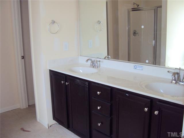 2333 Everstone Road Wake Forest, NC 27587 - Photo 10 of 20 double vainity offers plenty of elbow room and cabinet/drawer space for two! Features separate tub and shower and private water closet.