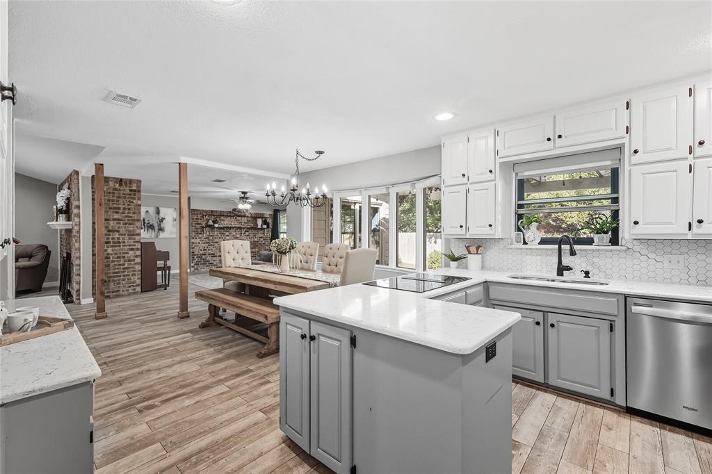 2908 Steve Drive Hurst, TX 76054 - Photo 16 of 40 a kitchen with lots of counter space and sink