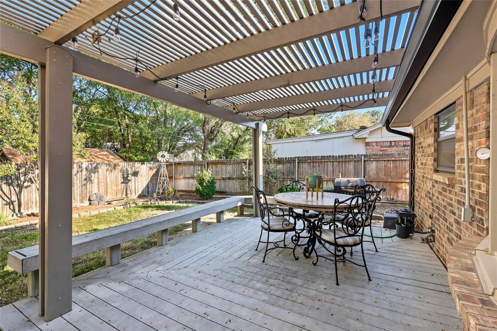 2908 Steve Drive Hurst, TX 76054 - Photo 33 of 40 a dining room with furniture and wooden floor