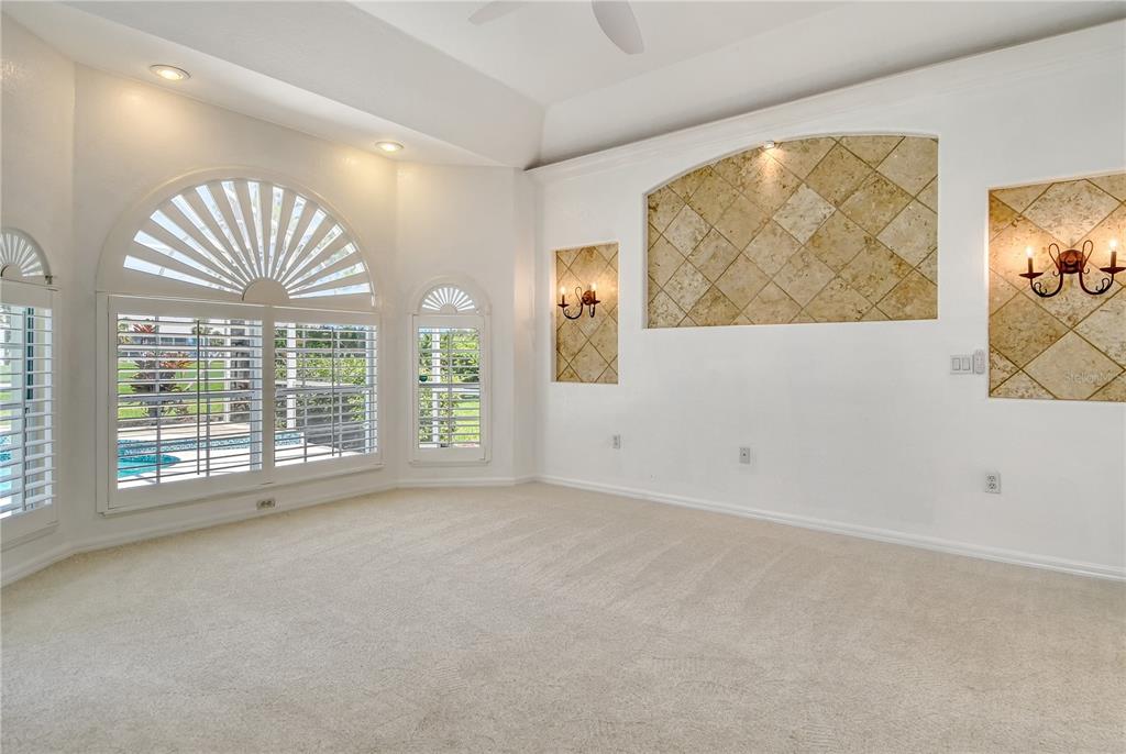 340 Bermuda Court, Unit 5 Venice, FL 34293 - Photo 20 of 52 a view of an empty room with a window