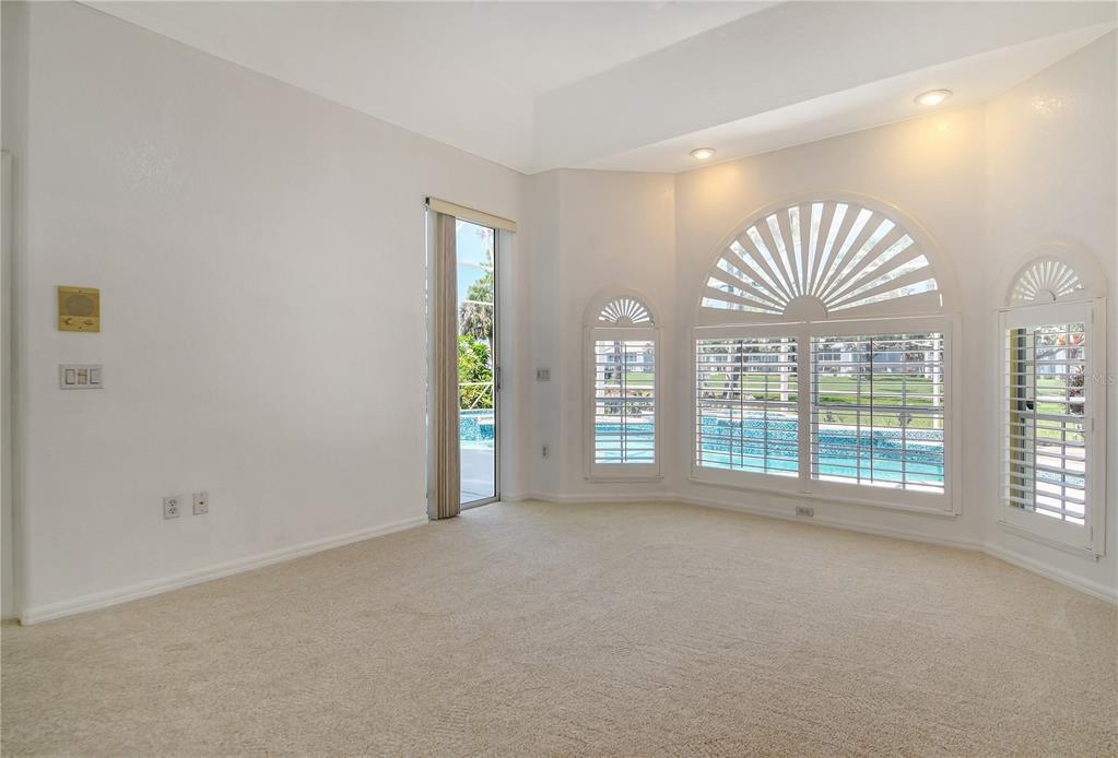 340 Bermuda Court, Unit 5 Venice, FL 34293 - Photo 22 of 52 a view of an empty room with a window
