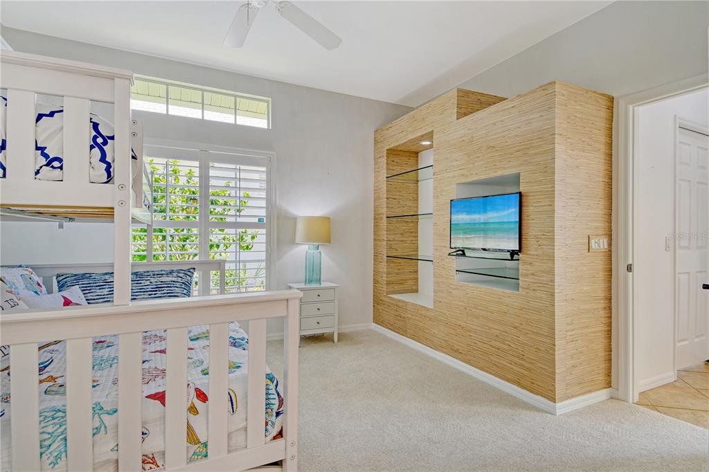 340 Bermuda Court, Unit 5 Venice, FL 34293 - Photo 29 of 52 a view of hallway with furniture and a window