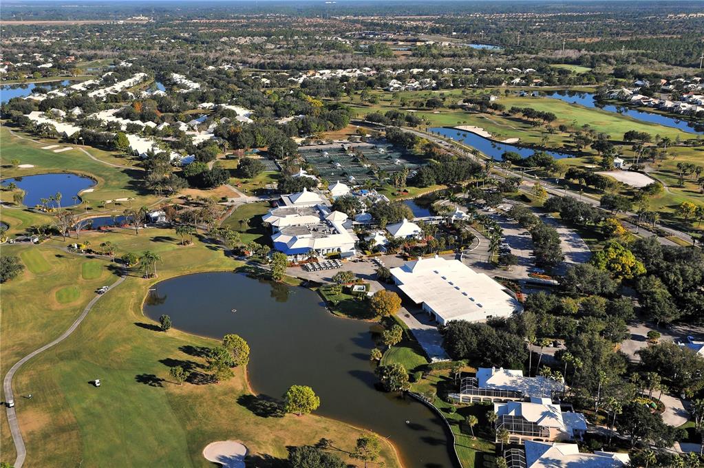 340 Bermuda Court, Unit 5 Venice, FL 34293 - Photo 49 of 52 an aerial view of residential houses with outdoor space