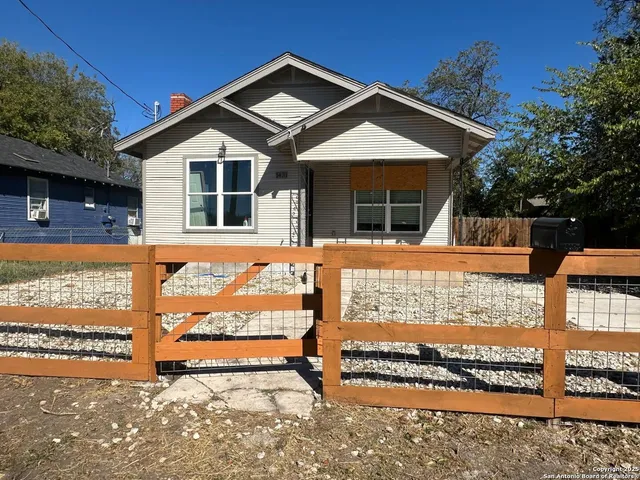 front view of a house with a street