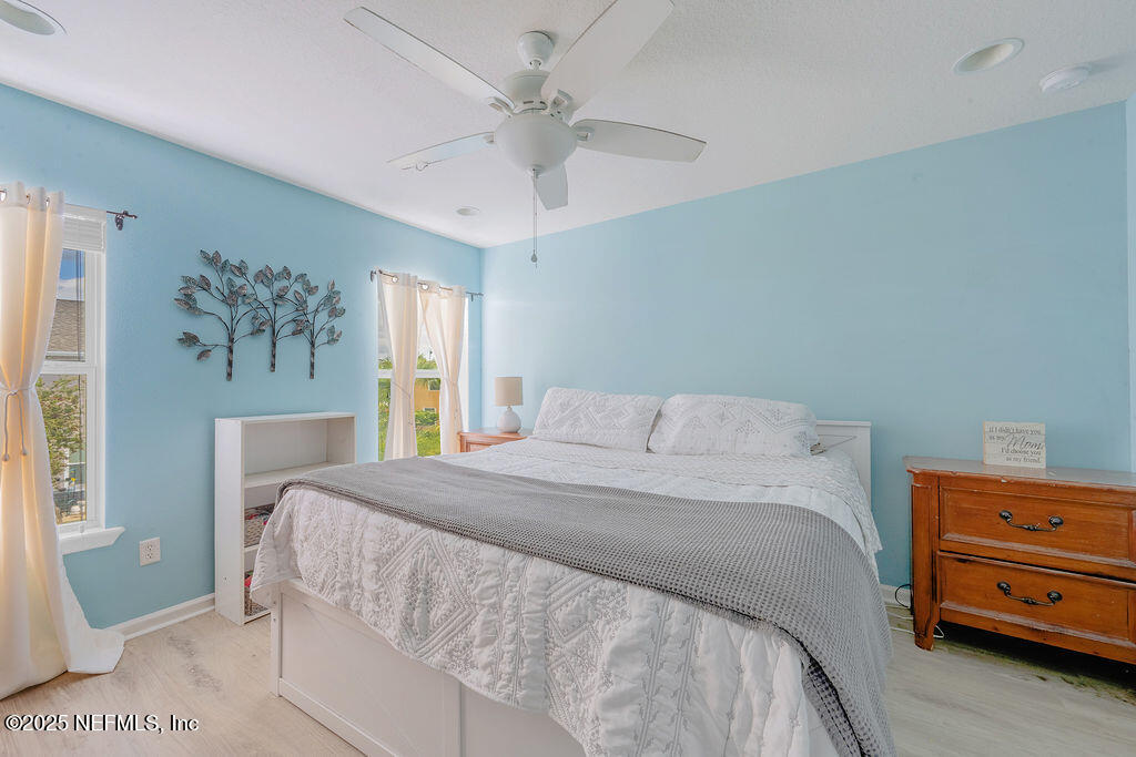 160 Crete Court St. Augustine, FL 32084 - Photo 15 of 33 a bedroom with a bed and a dresser