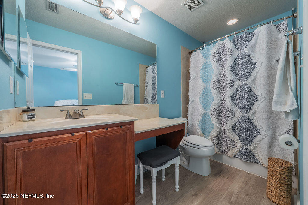 160 Crete Court St. Augustine, FL 32084 - Photo 17 of 33 a bathroom with a sink toilet and shower