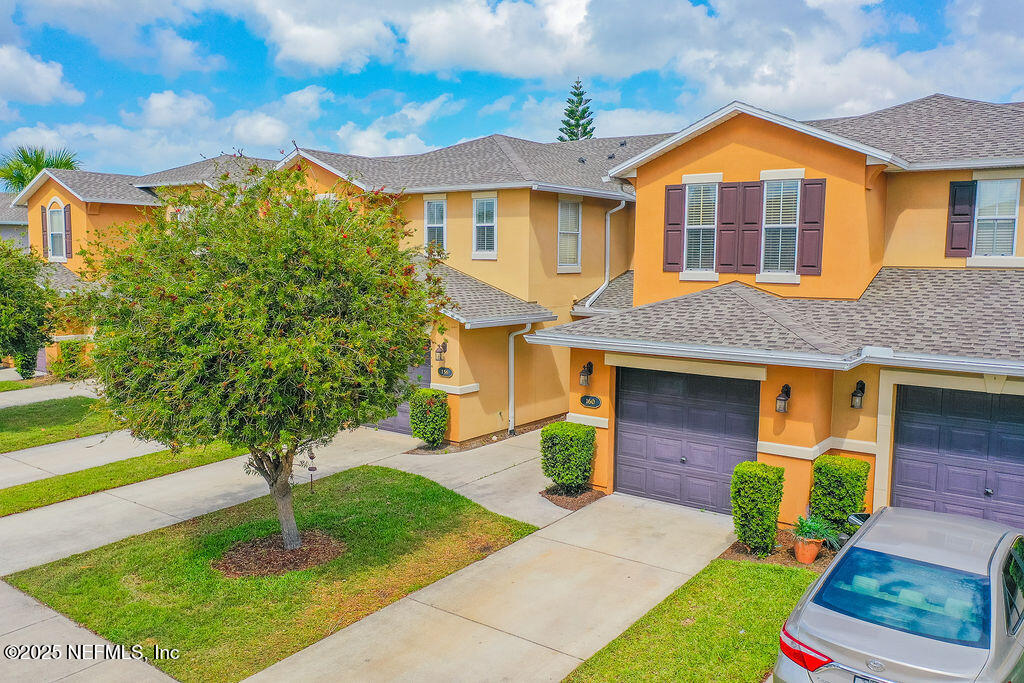 160 Crete Court St. Augustine, FL 32084 - Photo 2 of 33 a front view of a house with a yard