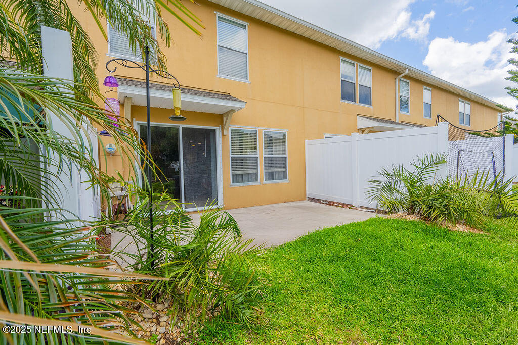 160 Crete Court St. Augustine, FL 32084 - Photo 30 of 33 a front view of a house with a yard