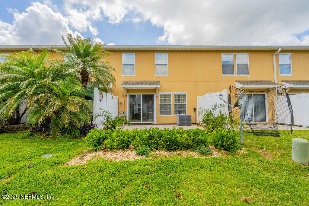 160 Crete Court St. Augustine, FL 32084 - Photo 31 of 33 a front view of a house with a garden