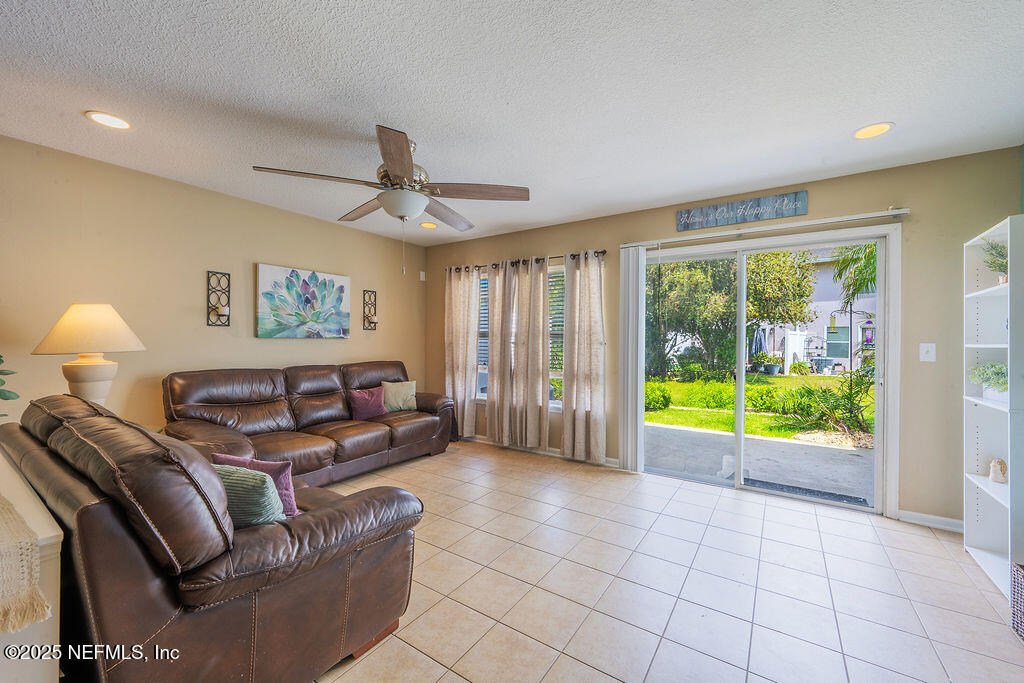 160 Crete Court St. Augustine, FL 32084 - Photo 6 of 33 a living room with furniture and a large window